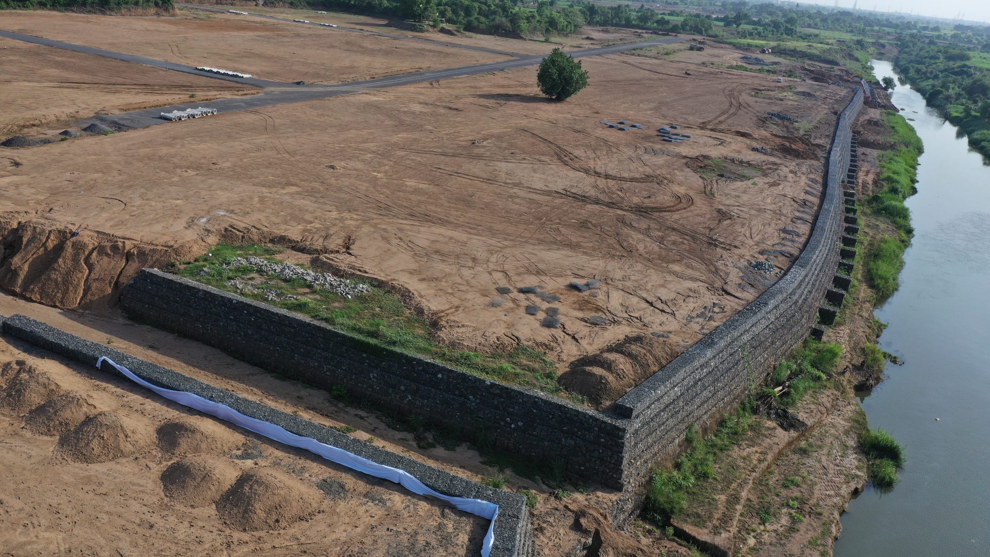 Double-twisted hexagonal wire mesh gabion baskets filled with rock